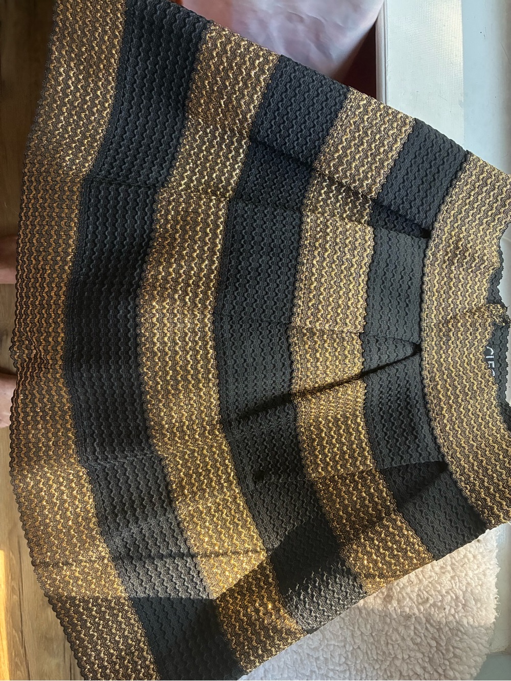 Black and gold shimmery pleated Cleo skirt size medium